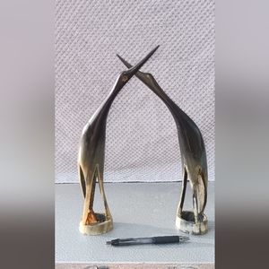 Carved horn egrate.  One of the beaks is a little split